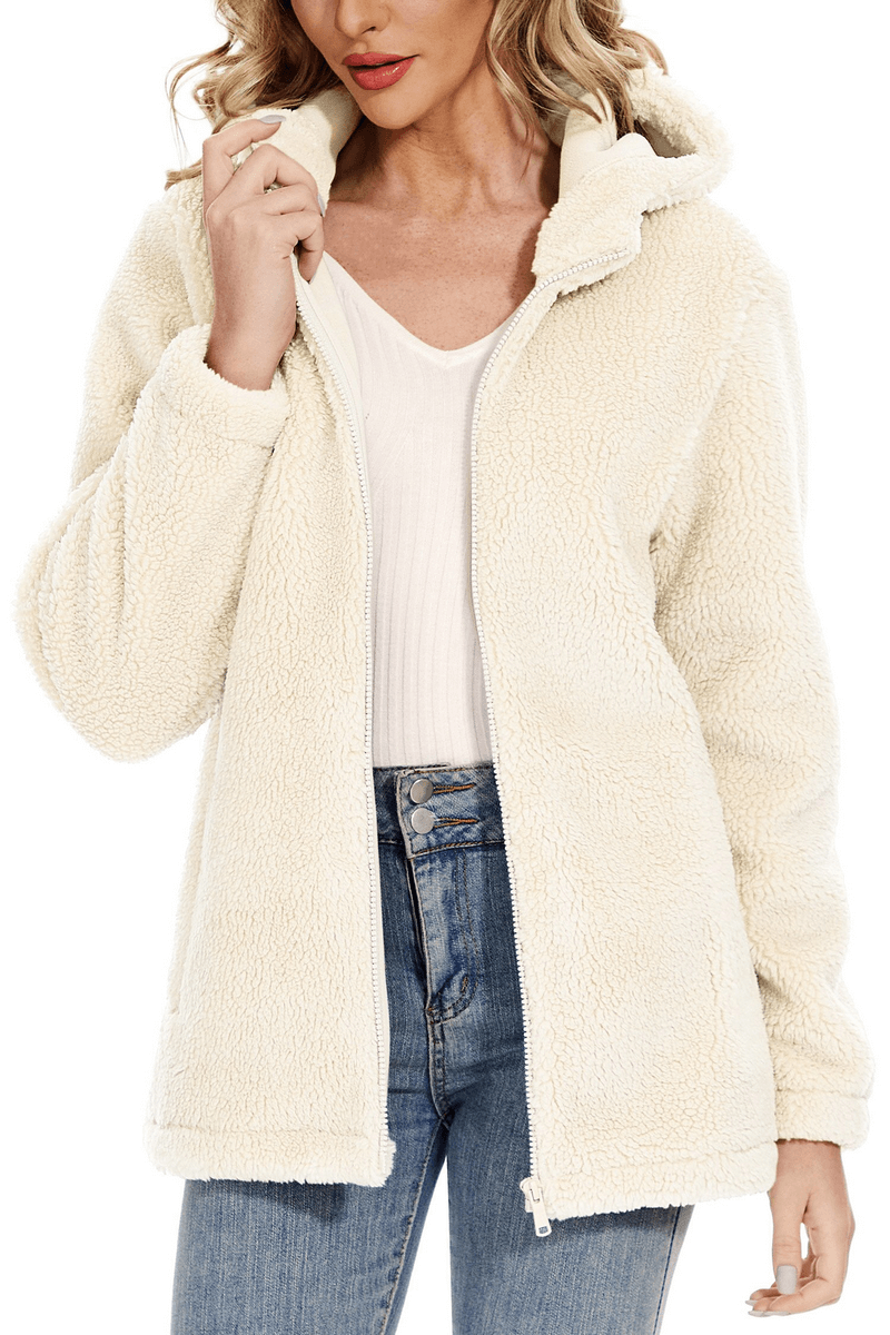 Stylish Fluffy Women's Jacket with Hood and Zipper in cream, perfect for winter fashion and warmth. Model wears jeans and white top.